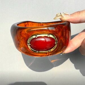 Amber Resin Bangle with Red Cabochon Accent